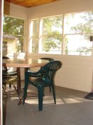 The porch in Cabin #13 offers a Great view of Portage Lake.