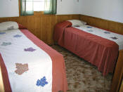 The second bedroom in Cabin #14 has two twin beds.