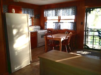 The kitchen in Cabin #2 is bright and clean.