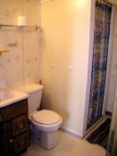 The bathroom in Cabin #9 is clean and bright.